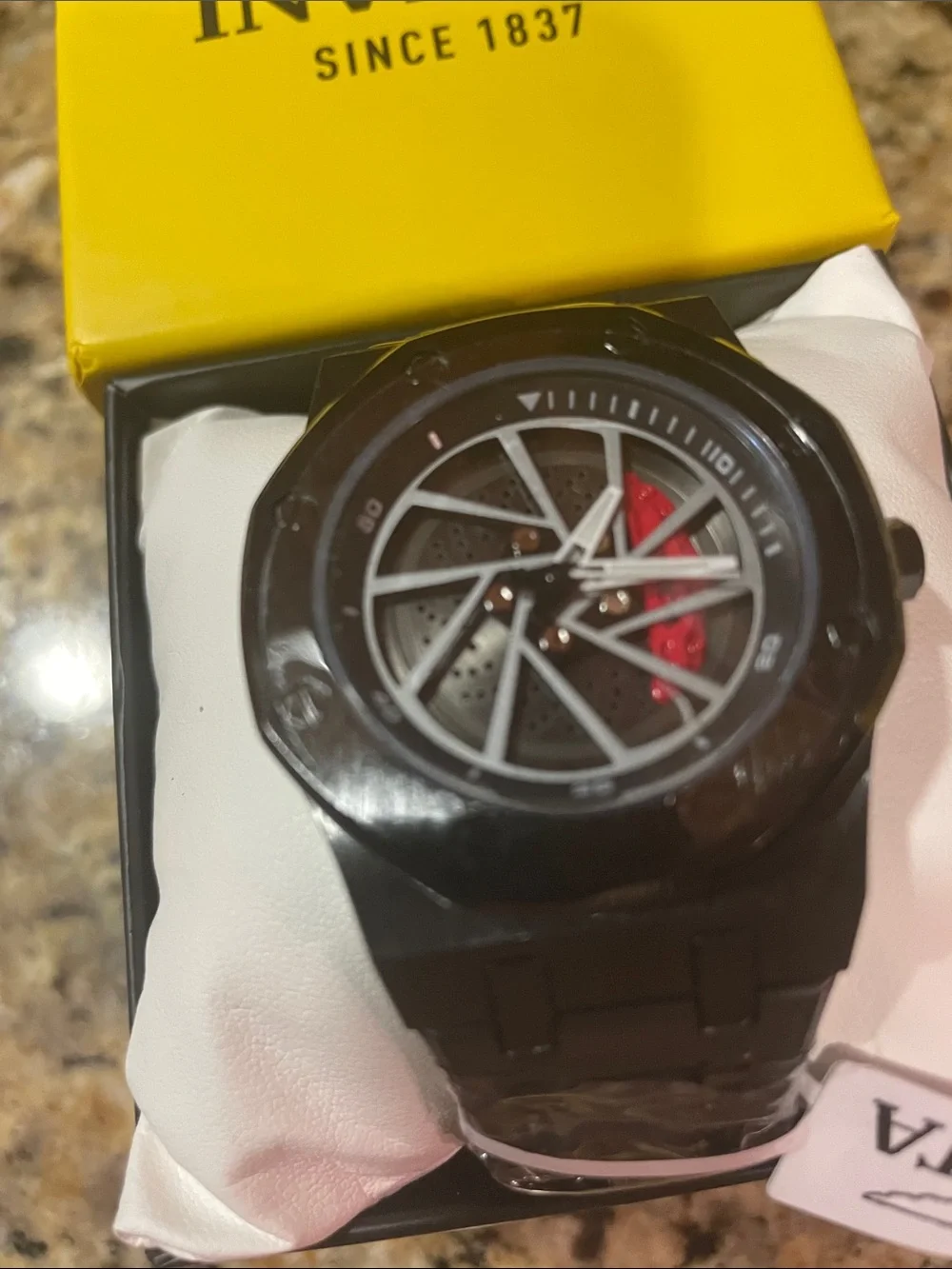 Invicta Speedway Rim Black Watch with Red Dial Accent